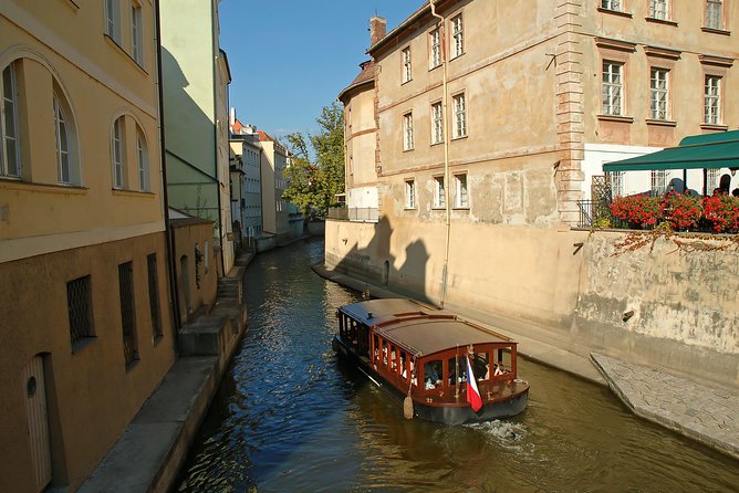Best of Prague Private Walking Tour (Left and Right Riverbank) - Mozart, Charles University, and the route toward Wenceslas Square