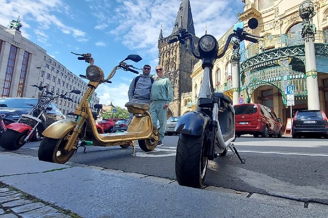 Create your own route on eScooter and enjoy Prague on wheels! - Malá Strana, the Lennon Wall, and Charles Bridge