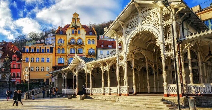 From Prague: Private Karlovy Vary & Crystal Factory Tour - Entering Karlovy Vary’s spa center