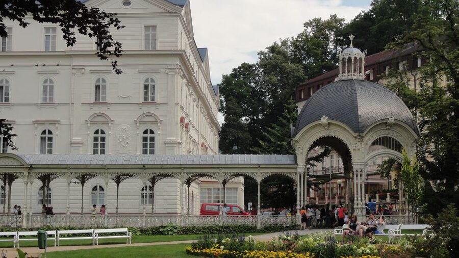 From Prague: Private Karlovy Vary & Crystal Factory Tour - Taking a dip at the Thermal hotel pool