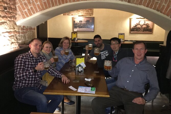 Old Prague pubs tour. Beer and dinner included! - Crossing Charles Bridge between the Old Town and Malá Strana