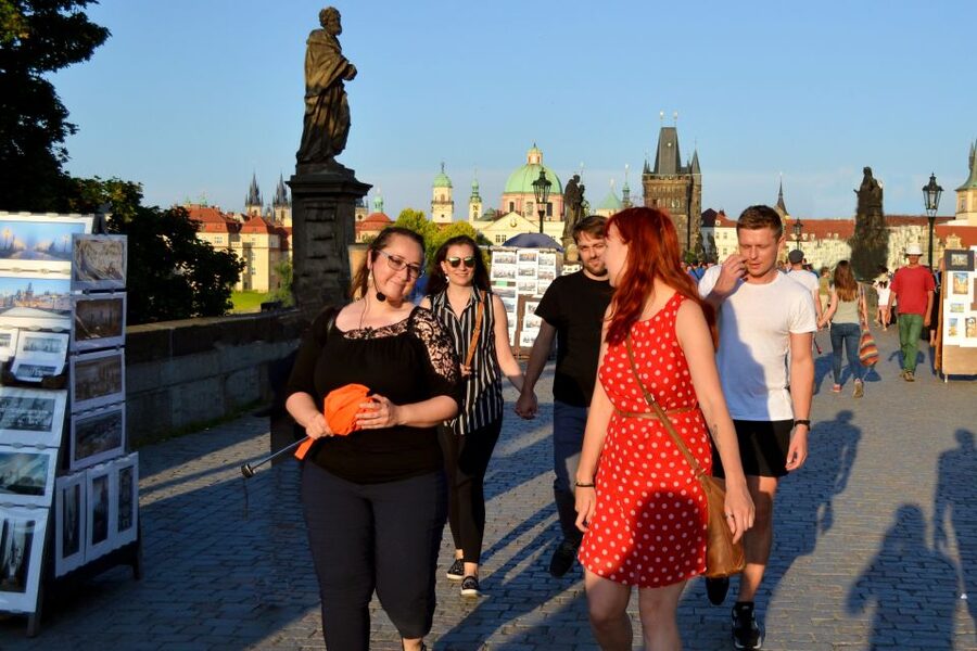 Panoramic Views of Prague Evening Walking Tour - Crossing Charles Bridge toward Prague Castle