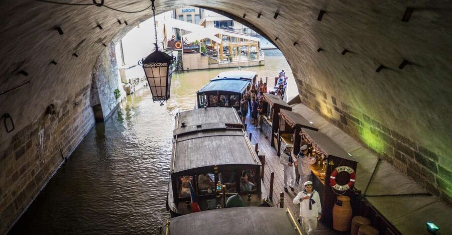 Prague: 3–Hour Castle Grounds Walking Tour and River Cruise - Crossing Charles Bridge with a local story