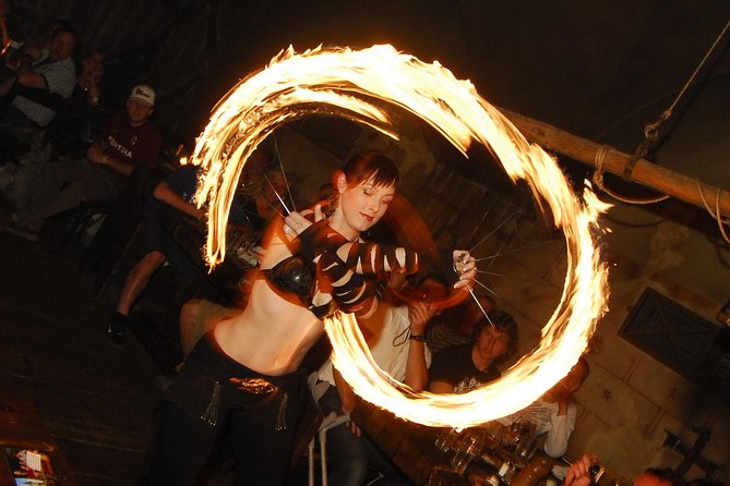 Prague 5 Courses Medieval Dinner and Live Performances - Entering Prague’s candlelit medieval tavern