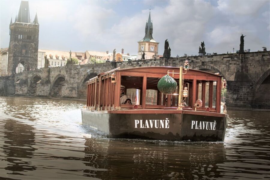 Prague: 6-Hour Tour with River Boat Cruise and Lunch - Riding the tram up to Hradcany