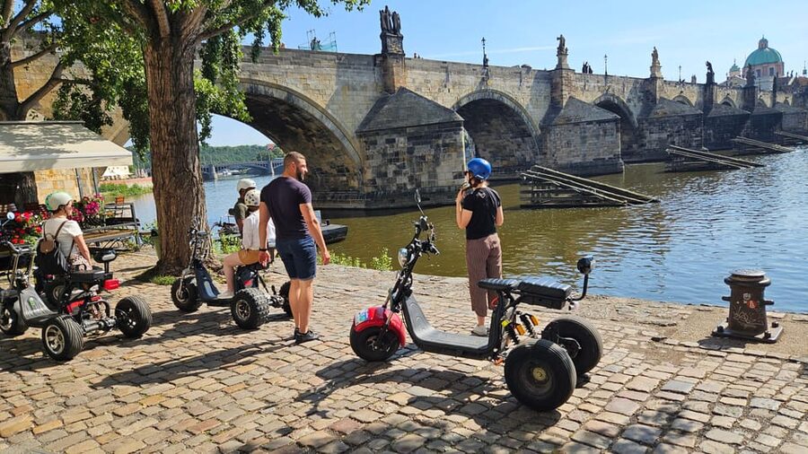 Prague: City Highlights Tour by Electric Trike - Charles Bridge from the river side