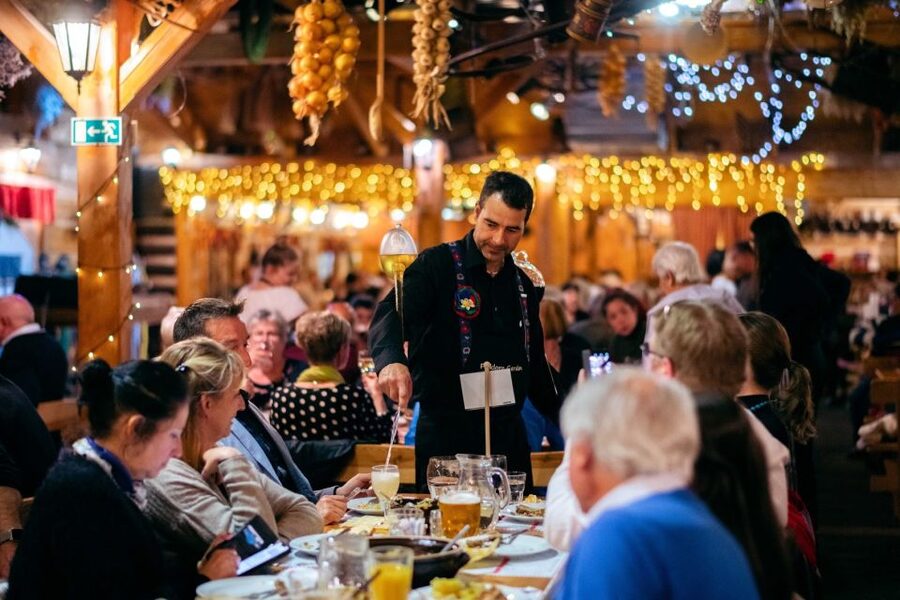 Prague: Evening Folklore Garden Party with Traditional Menu - Folk costumes, music, and a show you can join