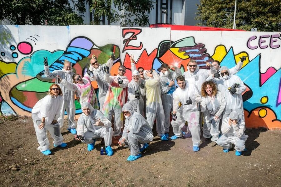 Prague Graffiti Workshop For Groups & Team-Building Groups - What the black wall and protective gear add