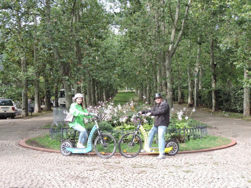 Prague: Grand e-Scooter Guided Tour - Guides, pace, and group size