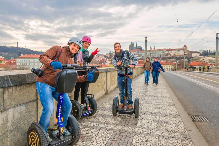 Prague: Grand Segway and eScooter Live Guided City Tour - Changing from the Hugo scooter to a Segway