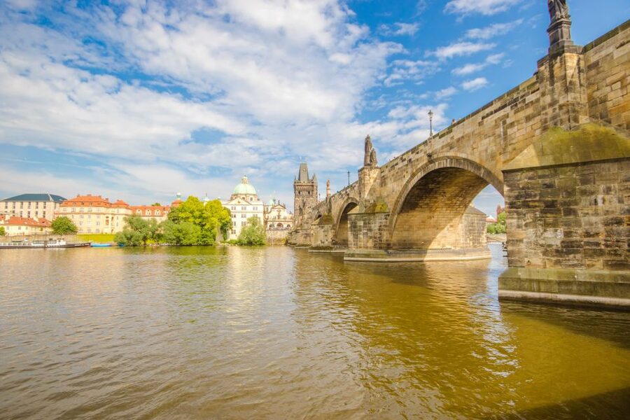Prague: Guided Bus & Walking Tour with River Cruise & Lunch - The opening bus ride through central Prague