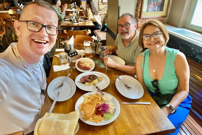 Prague Highlights 4 Hour Private Walking Tour - Walking up Nerudova Street
