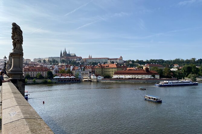 Prague in One Afternoon: Private Walking Tour with Marek - Crossing Charles Bridge toward Lesser Town