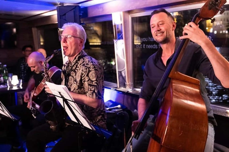 Prague: Jazz Boat Cruise with Live Concert and Optional Meal - A relaxed view of Prague from the Vltava