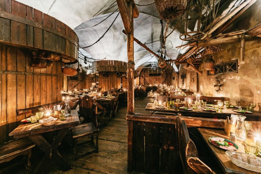 Prague: Medieval Dinner with Unlimited Drinks - Entering U Pavouka for a medieval-style evening