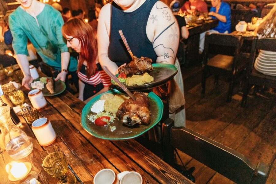 Prague: Medieval Dinner with Unlimited Drinks - Shared tables, new company, and tight seating