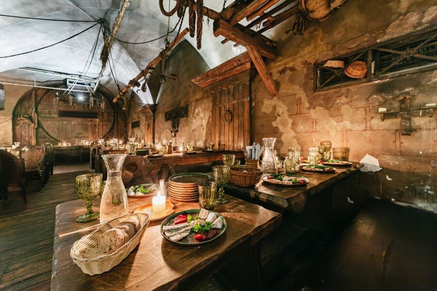 Prague: Medieval Dinner with Unlimited Drinks - Candlelight atmosphere, with one practical flaw