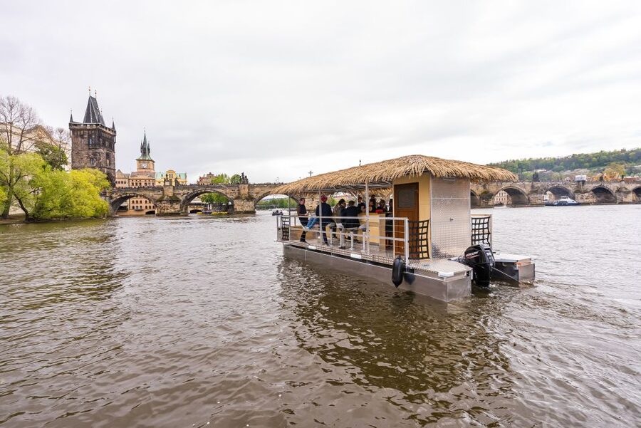 Prague: Party Tiki Boat Sightseeing Cruise with Drinks - Charles Bridge from the water