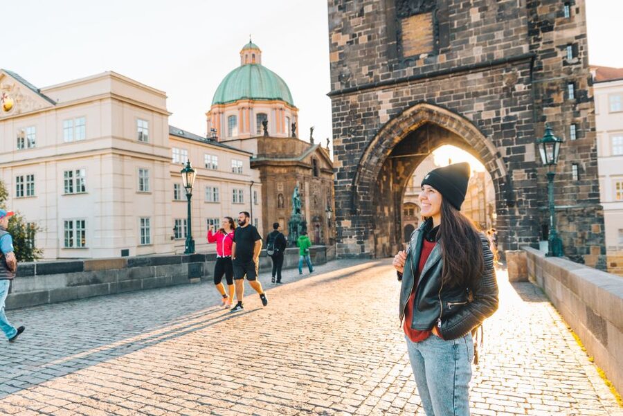 Prague: Professional Photoshoot at Charles Bridge - Crossing into the main photo stop