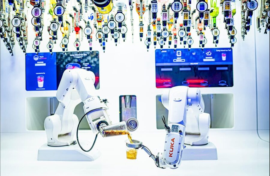 Prague: Robotic Bar Entry with a Drink Included - Watching the robotic arms at work