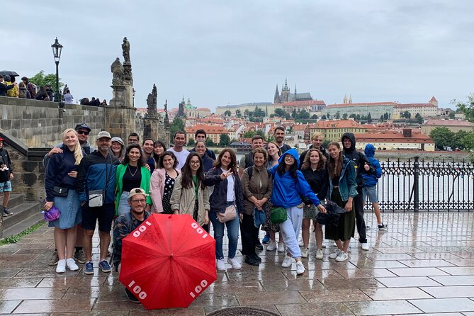 Prague’s TOP Sights - Old Town, Jewish Quarter, Charles Bridge (Tip-based tour) - Crossing Charles Bridge with stories, statues, and river views