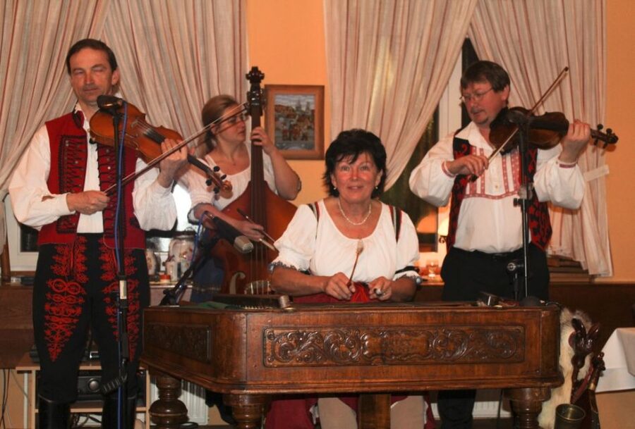 Prague: Traditional Folklore Evening with Dinner & Music - Reaching the wine cellar from Prague