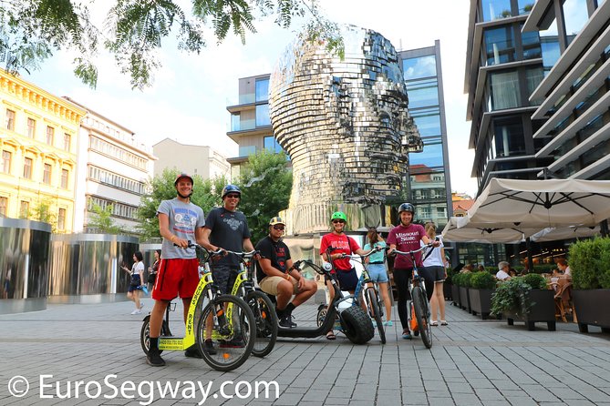 Prague Trike & e-Scooter Tour: Castle Viewpoints & Charles Bridge - Prague’s narrowest street and the Kafka Museum