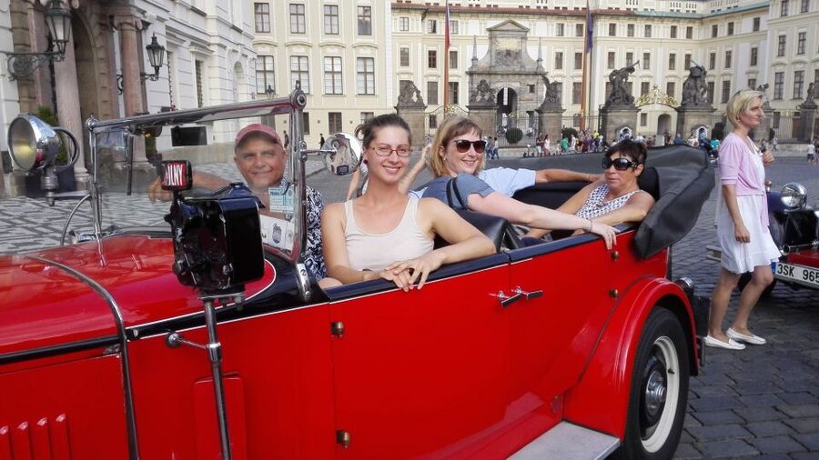 Prague: Vintage Car Ride and Walking Tour - Walking toward Charles Bridge