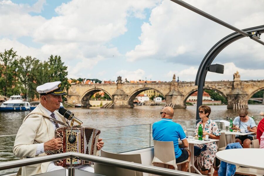 Prague: Vltava River Lunch Cruise in an Open-Top Glass Boat - Charles Bridge from below