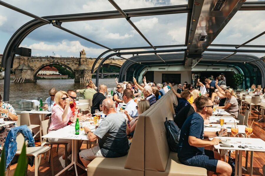 Prague: Vltava River Lunch Cruise in an Open-Top Glass Boat - Music, atmosphere, and the open-top question
