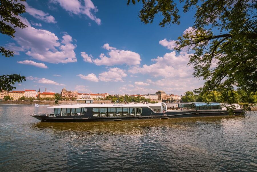 Prague: Vltava River Sightseeing Cruise - The boat, seating, and outdoor space