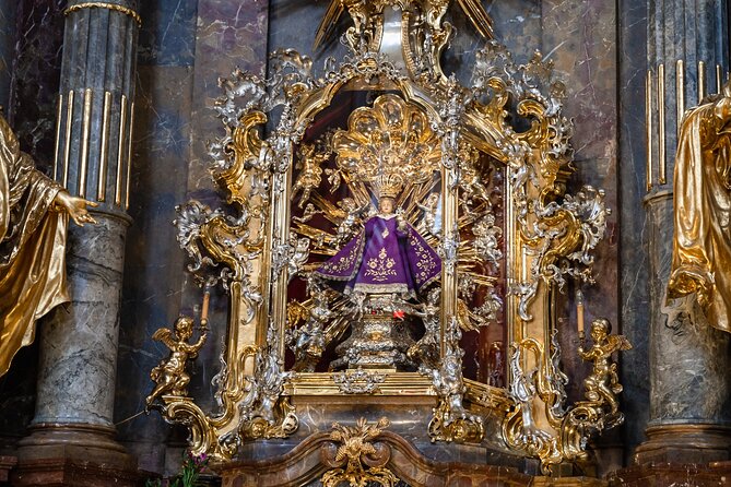 Private Walking Tour: From Charles Bridge to Prague Castle - The Infant Jesus of Prague brings a different kind of landmark