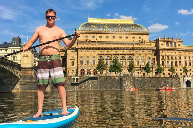 Stand-Up Paddleboarding on the Vltava River in Prague - Seeing Prague Castle and Charles Bridge from a board