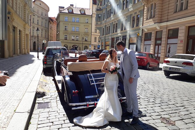Vintage Cars Prague - Sightseeing Tour 90min / 1-6 pers. - Charles Bridge from a vintage car